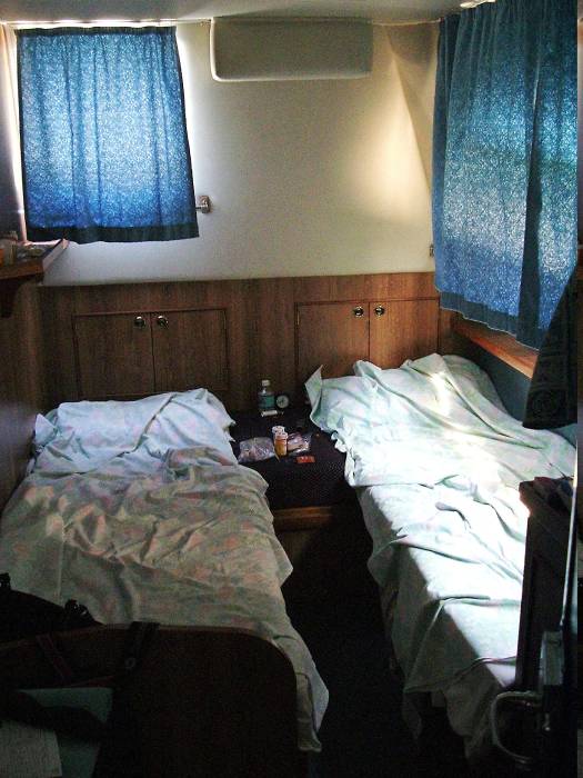 Aft cabin with two bunks on board the canal boat.