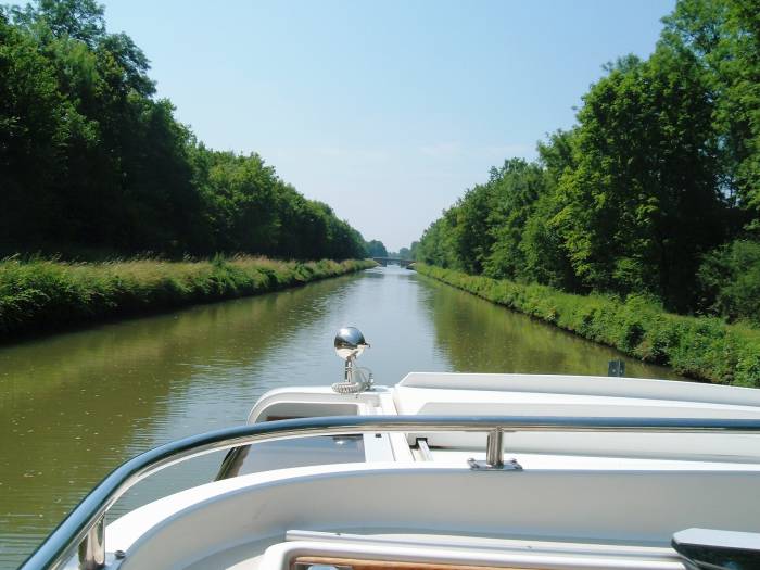 A tree-lined canal in central France