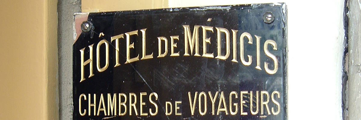 Sign at l'Hôtel de Médicis in Paris.
