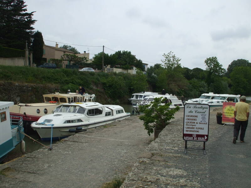 Boats lined up to descend the Fonserannes staircase locks on Canal du Midi in Béziers.