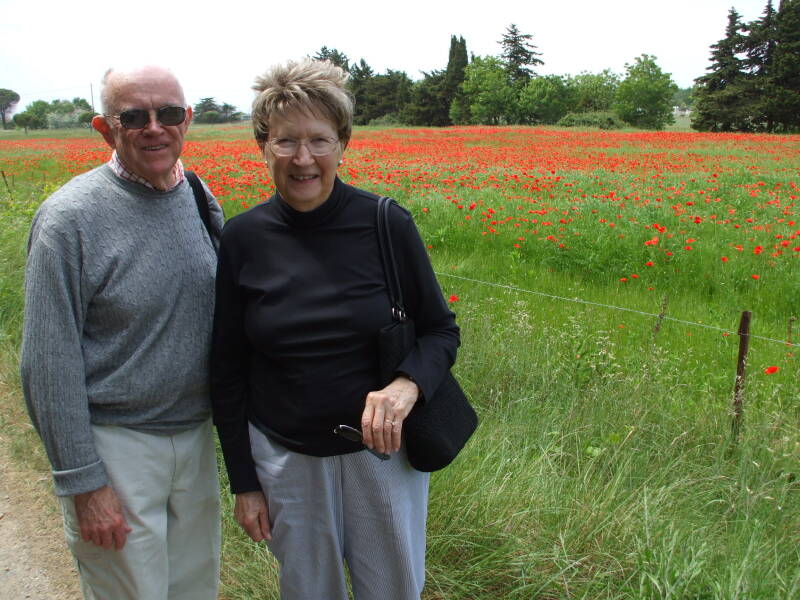 Bill and Betty Cromwell at a field of red poppies at Port Cassafières.