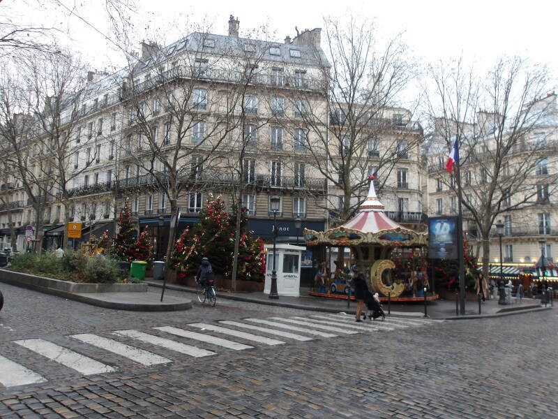 Christmas decorations in in a small square in Paris.