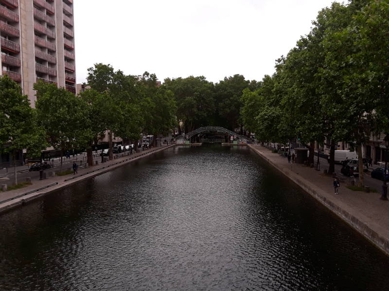 Walking south along the Canal Saint-Martin in the 10th arrondissement in Paris.