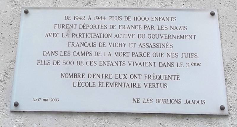 Memorial marker at a school in the 3rd arrondissement in Paris.