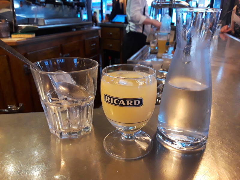 Relaxing with a pastis in Paris