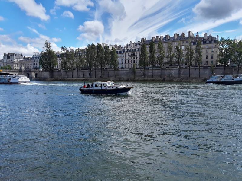 Strolling along the Seine River through Paris.