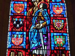 Stained glass window showing Joan of Arc in Chinon.