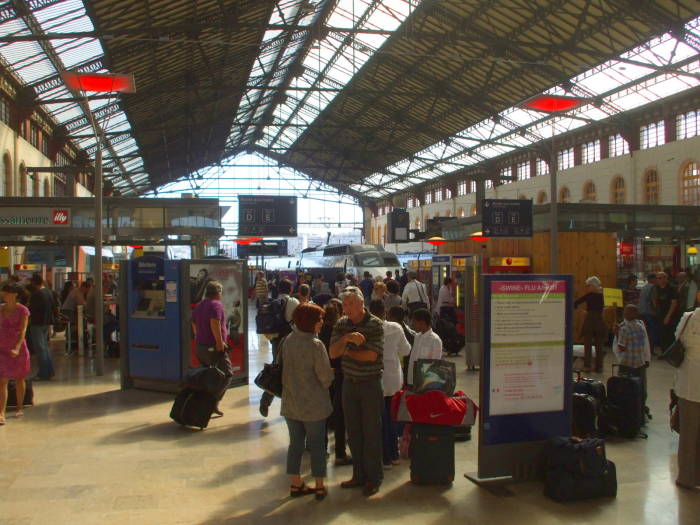People boarding trains in Marseille's Gare Saint-Charles.