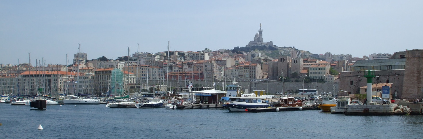 Vieux Port, the old central harbor in Marseille, overlooked by Nôtre Dame de la Garde.
