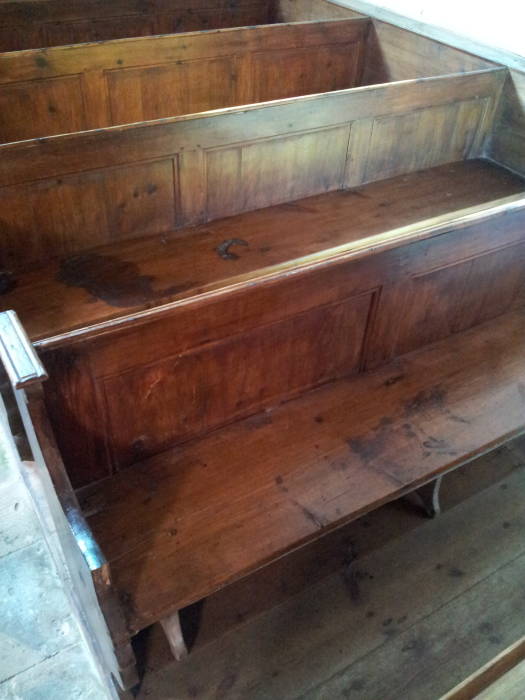 Blood stains on the pews of the church at Angoville au Plain.