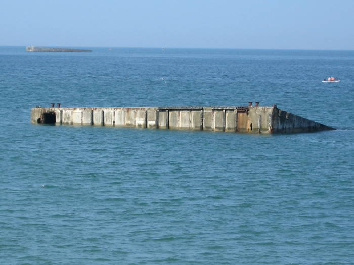'Mulberry' artificial harbor components at Arromanches, used after D-Day to land the Allied forces.