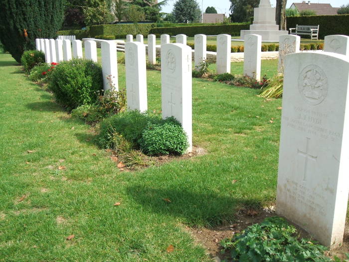British WWII cemetery with unique stones and planting.
