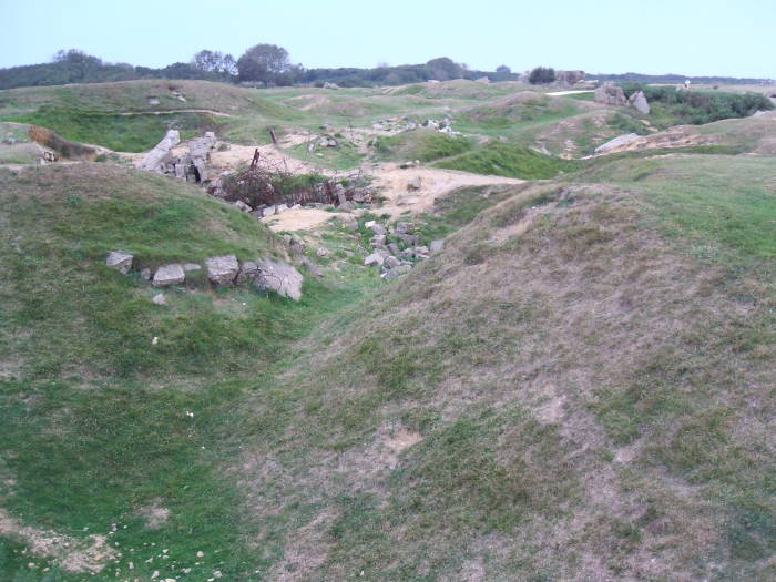 Shell craters and ruins at Pointe du Hoc.