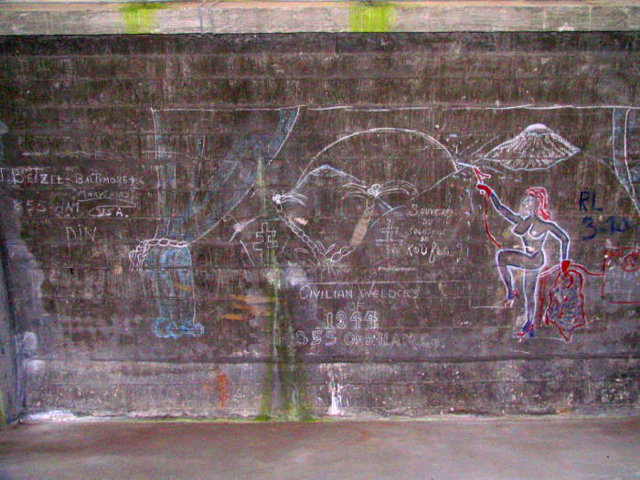 WWII graffiti inside a hanger in France.