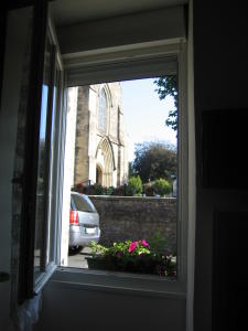 View out our apartment toward the church in Sainte-Mere-Eglise.