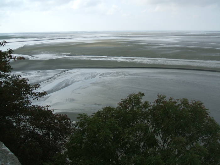 Mud flats many kilometers wide, caused by the extreme tides along the coasts of Normandy and Brittany.