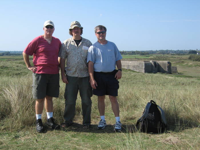 Jeff, Bob, and Tim at a blockhouse just behind the dune at les Hougues on Utah Beach, looking inland toward Sainte-Mère-Église.