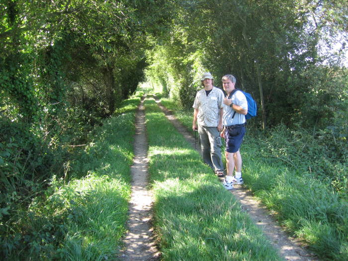 Bob and Tim on the path, the GR or Grande Randonee, from Utah Beach toward Sainte-Mère-Église.