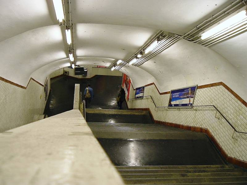 Paris Métro station staircase.