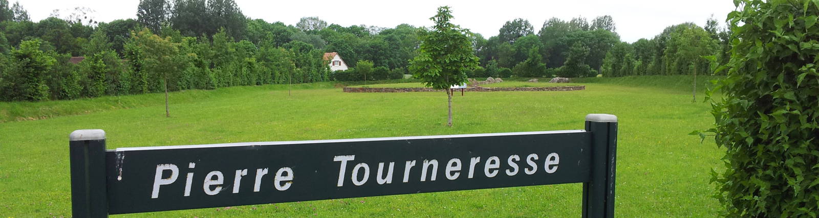 Sign at the entrance to the Pierre Tourneresse neolithic passage grave.