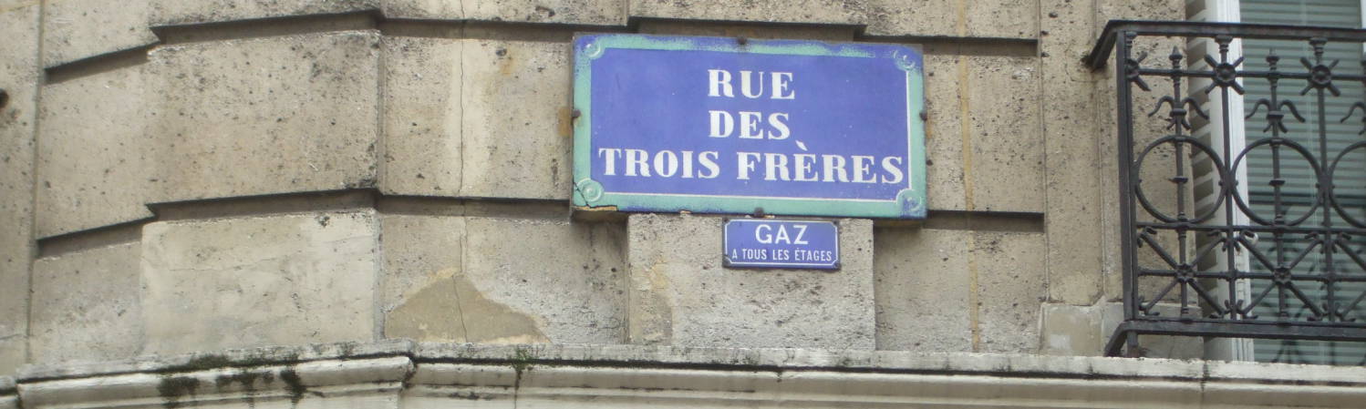 Street sign for Rue des 3 Frères in the 18th Arrondisement of Paris.