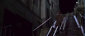 Sam (Robert De Niro) moves down the staircase of Rue Drevet toward Rue des 3 Frères and the café Blue Sky.