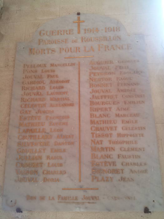 Plaque listing 38 men from Roussillon killed in World War One, in the nave of the Church of Saint Michael.