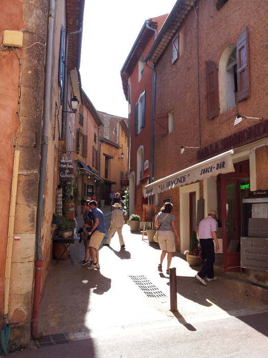 A pedestrian lane runs into the center of old Roussillon.