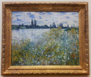 Claude Monet's 'Ãle aux Fleurs near Vétheuil' (1880) showing the view from the mid-river island at the Metropolitan Museum of Art in New York.