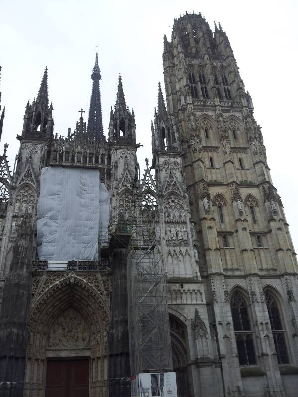 Cathédrale Notre-Dame de l'Assomption in Rouen, France on a cold and wet morning.