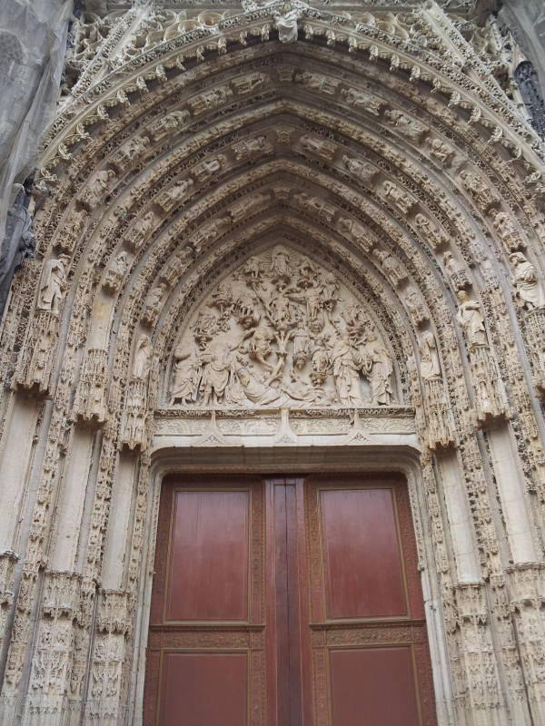 Elaborately carved entryway of the Cathédrale Notre-Dame de l'Assomption in Rouen, France.