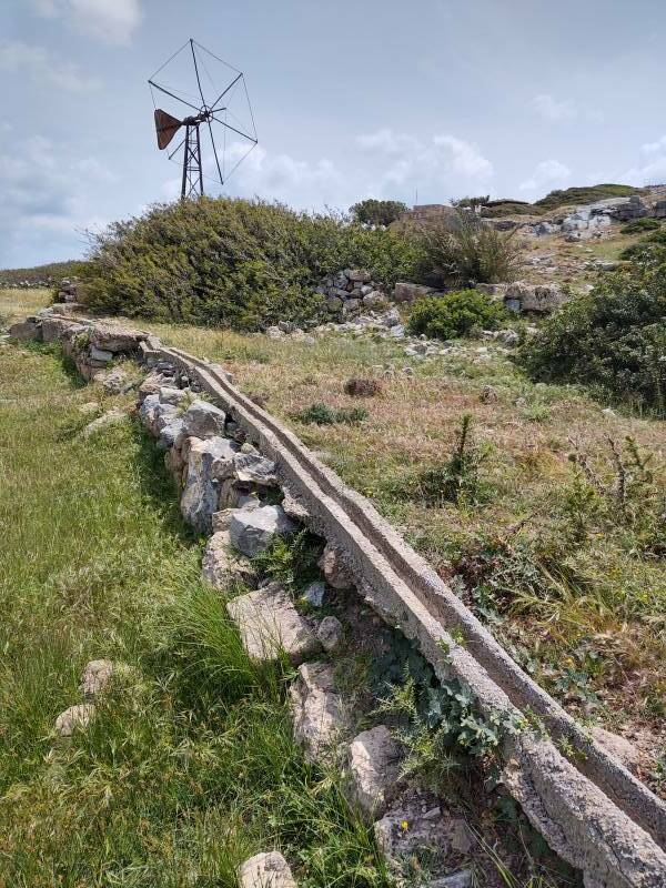 Windmill and water channel at Itanos.