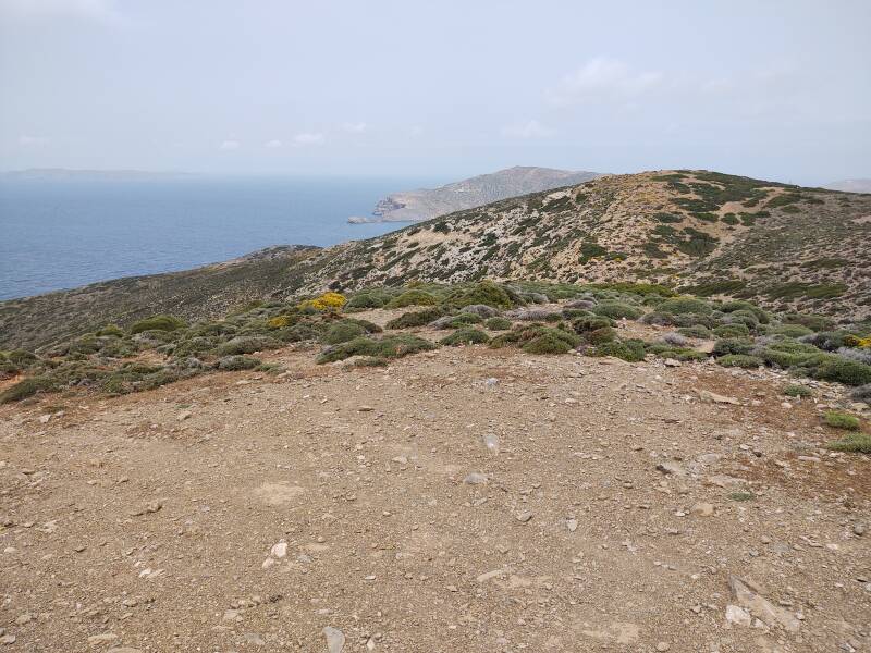 View from road west of Itanos, looking back to the northeast and out to sea, over the tip of the Itanos peninsula in the distance.