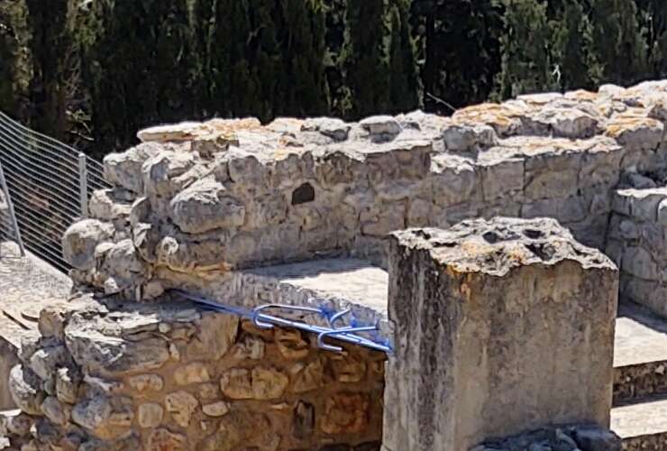 Detail of work repairing or extending the steel-reinforced concrete 're-imagining' at Knossos showing new or newly painted reinforcing rods.