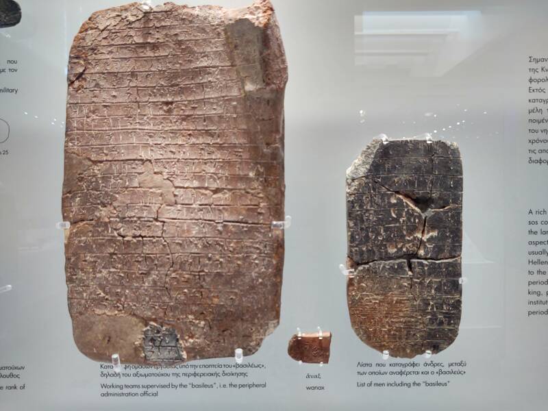 Clay tablets with Linear B script labor details.
