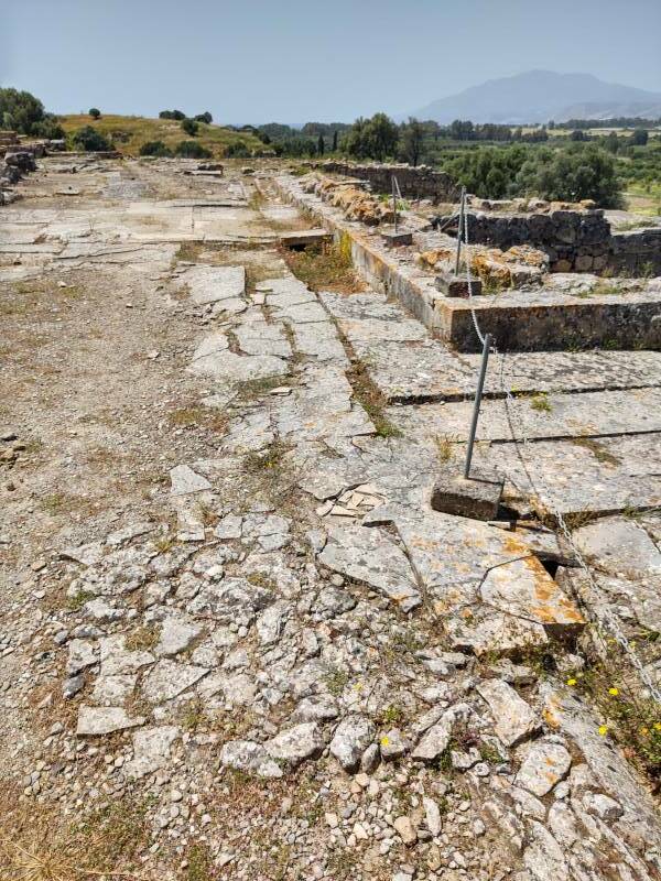 Drain along the side of the large open plaza at the Minoan settlement of Agia Triada in south-central Crete.