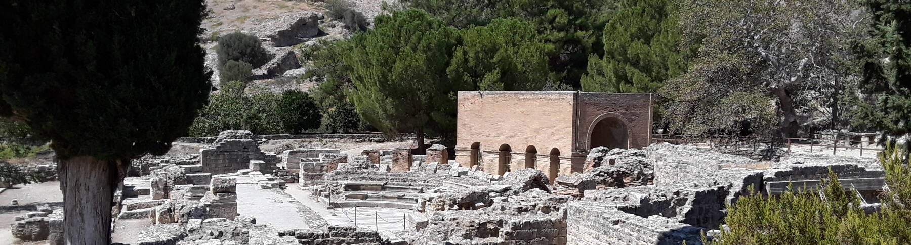 Amphitheatre and modern reconstruction of the Odeon housing the Gortyn Code.