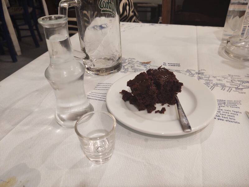 Dinner in Neo Kalamaki: chocolate cake and an ampoule of tsikoudia.