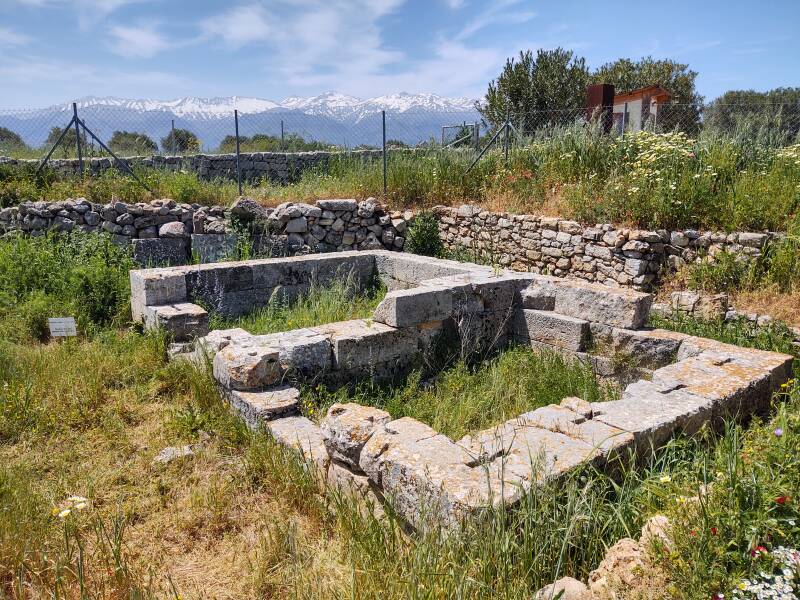 Dual or bilateral temple at the ancient site of Aptera in western Crete, overlooking Souda Bay. The Lefka Ori or White Mountains are in the background.