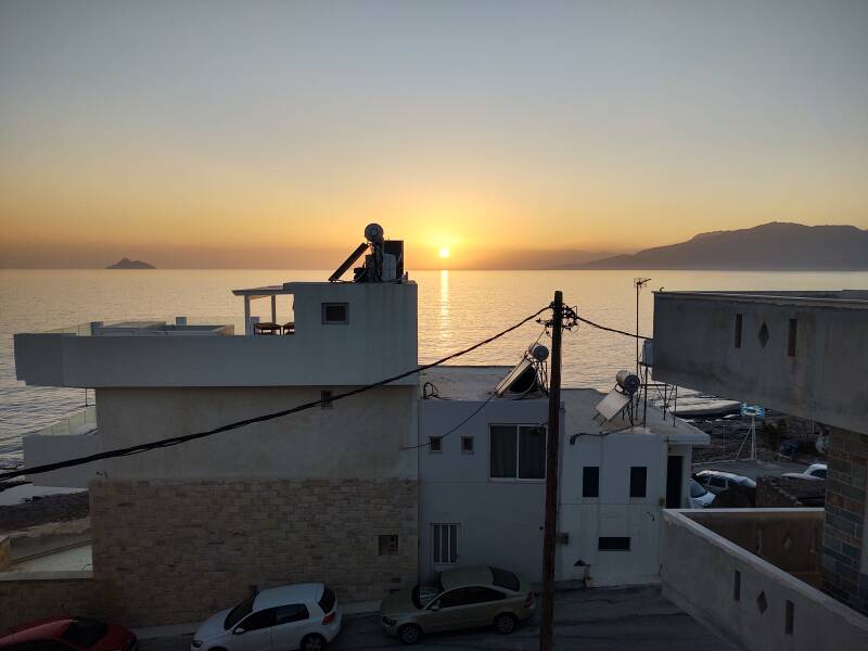 Sunset over Messara Bay and the Libyan Sea at Kalamaki on the south coast of Crete.