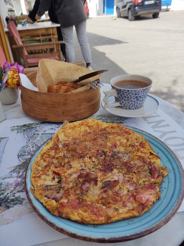 Breakfast at a cafe in Plateia Pounda, the main square in Hora on Folegandros.