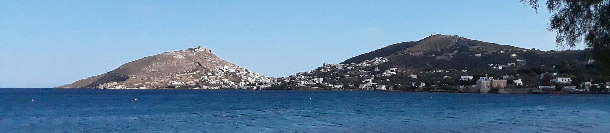 View across the bay from Alinda to Agia Marina and the Pandeli Castle.