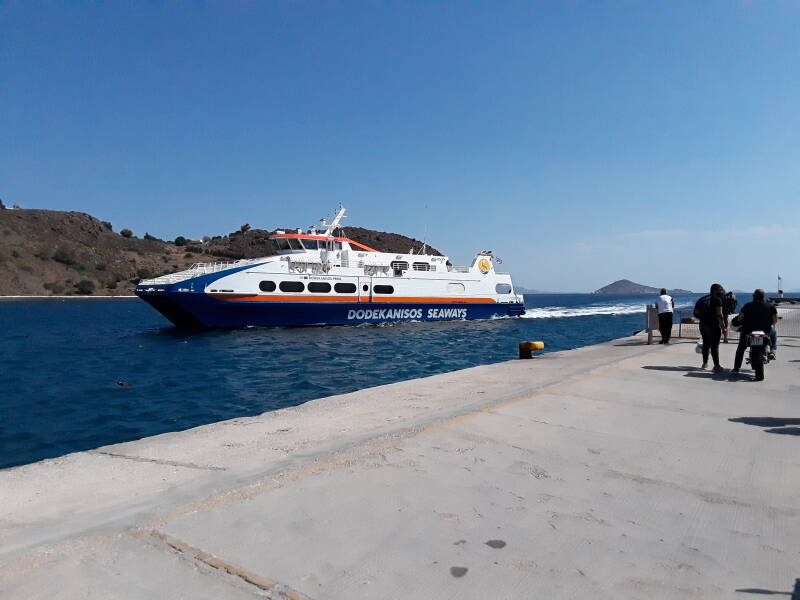 Small ferry approaching the dock in Patmos.