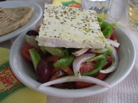 Greek horiatiki salata, or village salad, or country salad, called 'Greek salad' by people other than Greeks.