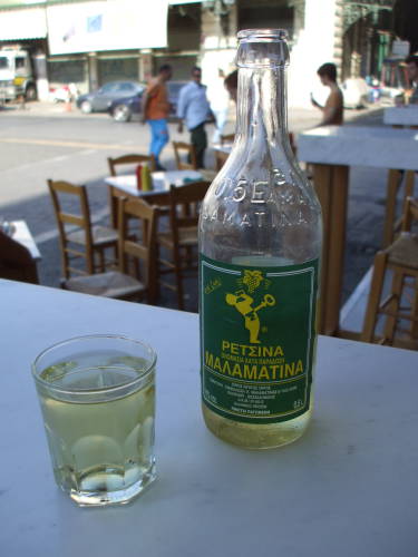 Greek wine: a bottle and glass of Malamatina retsina.