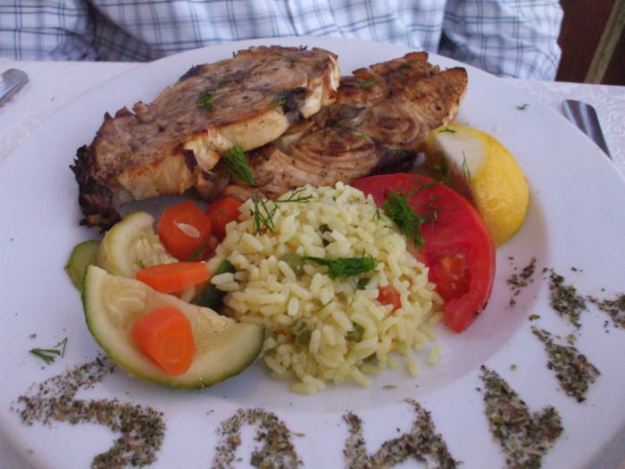 Grilled fish in a taverna on the Greek island of Santorini.