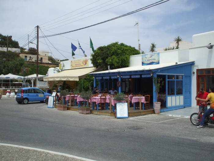Two tavernas in the harbor on Ios island.