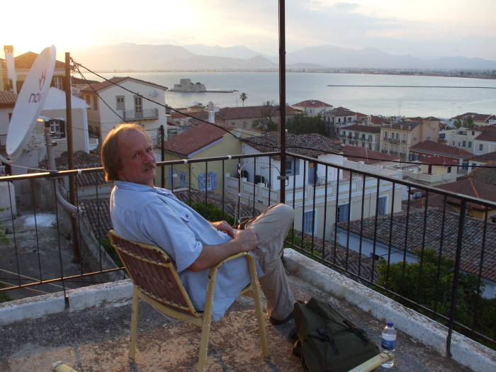Taking in the sunset over Nafplio harbor from the balcony at Dimitris Bekas guesthouse or domatia.