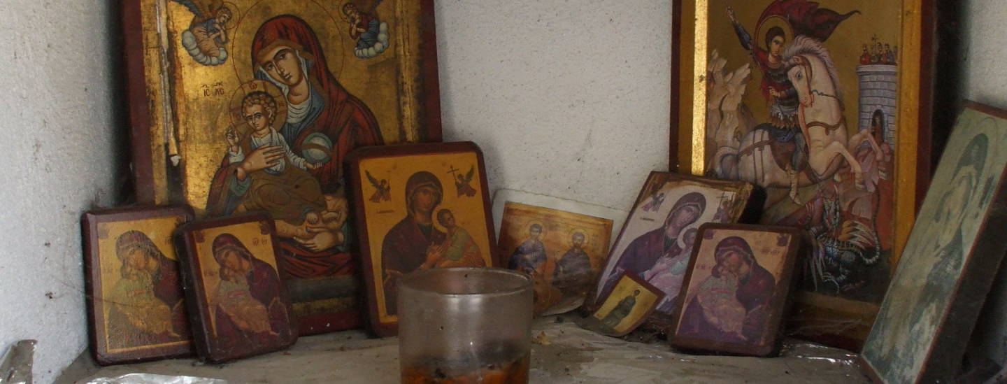 Several Greek Orthodox icons rest in a shrine at Kastraki, below Meteora.
