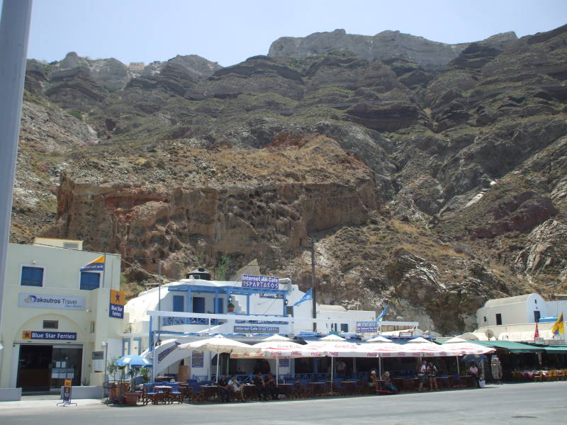 Santorini's port of Pirgos, with the steep caldera face above.